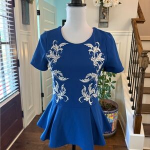 Anthropologie Lush NWOT Elegant Blue Peplum Top with White Embroidery